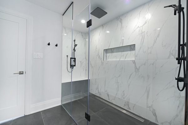 Modern bathroom with glass enclosed shower